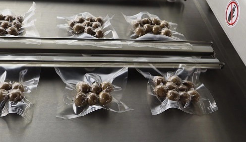 220V/380V macchina di imballaggio a vuoto continuo per alimenti a cintura di rotazione automatica